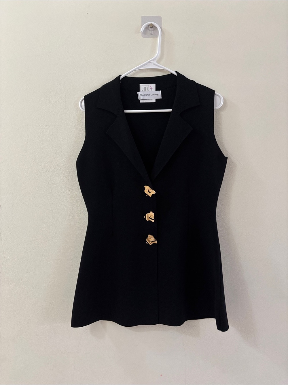 Sleeveless Tailored Black Vest with Gold Accent Buttons
